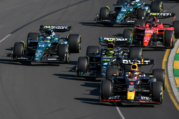 Max Verstappen leads Lewis Hamilton and Fernando Alonso at the start of the Formula 1 Australian Grand Prix.