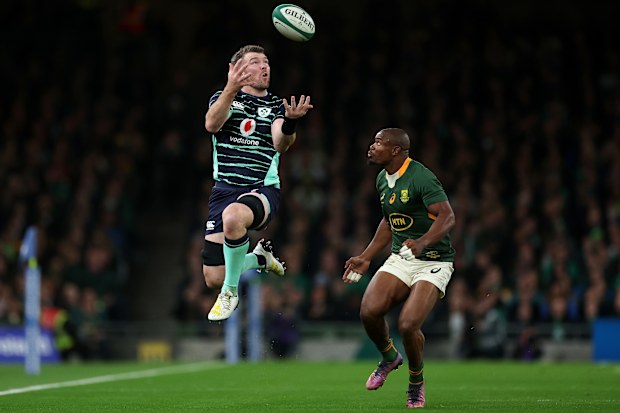 Peter O'Mahony of Ireland is tackled by Makazole Mapimpi of South Africa during the Autumn International in 2022.
