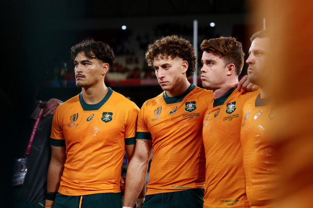 From left: Jordan Petaia, Mark Nawaqanitawase and Andrew Kellaway of Australia pictured after the Wallabies' 40-6 defeat to Wales.