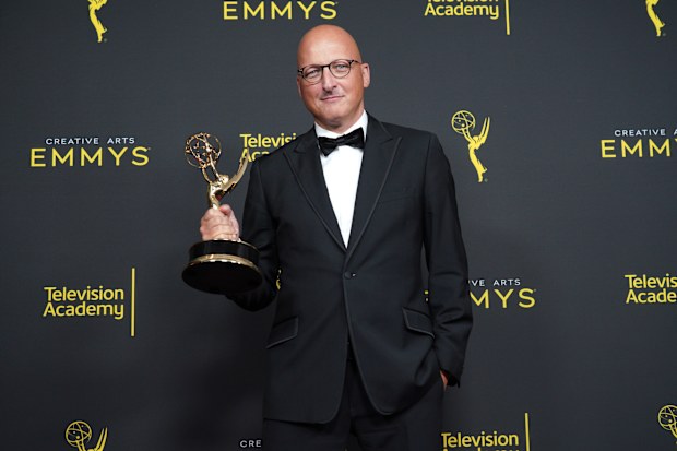 Director Dan Reed poses in the press room with the award for outstanding documentary or nonfiction special for Leaving Neverland' during the 2019 Creative Arts Emmy Awards on September 14, 2019 in Los Angeles, California. (Photo by JC Olivera/WireImage)