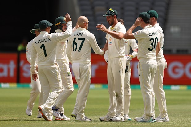 Nathan Lyon of Australia celebrates after taking the wicket of Roston Chase of the West Indies. (Photo by Cameron Spencer/Getty Images)