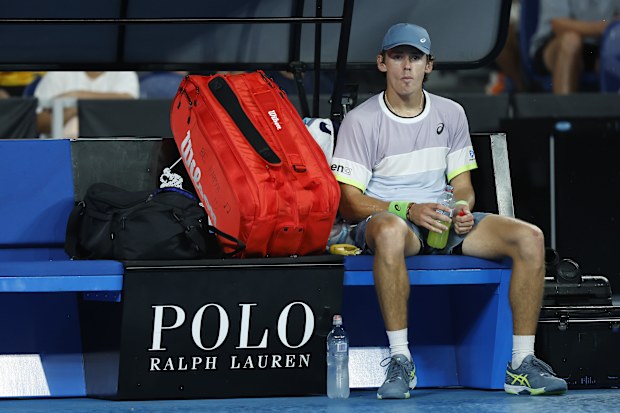 Alex de Minaur of Australia looks on during a rain delay. (Photo by Darrian Traynor/Getty Images)