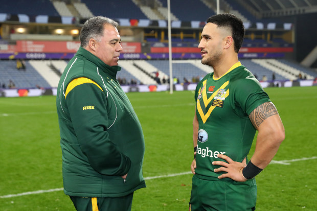 Kangaroos coach Mal Meninga speaks with Valentine Holmes following Australia's victory in the Rugby League World Cup quarter-final match between Australia and Lebanon.