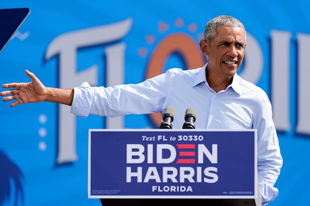 Former President Barack Obama speaks at a rally while campaigning for Democratic presidential candidate former Vice President Joe Biden.