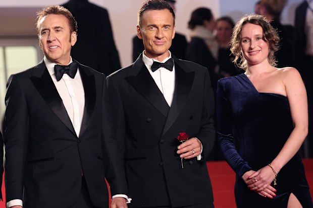CANNES, FRANCE - MAY 17: Nicolas Cage, Julian McMahon and Leonora Darby attend the "The Surfer" Red Carpet at the 77th annual Cannes Film Festival at Palais des Festivals on May 17, 2024 in Cannes, France. (Photo by Gisela Schober/Getty Images)