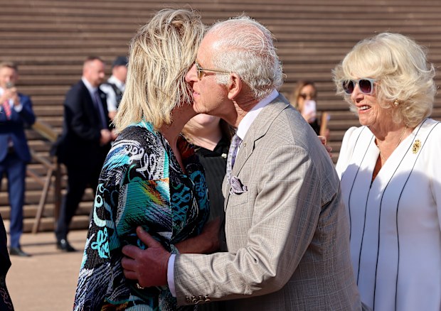 King Charles III is greeted by Dame Joanna Lumley at the Sydney Opera House Forecourt on October 22, 2024 in Sydney, Australia.