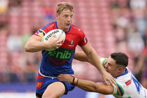 NEWCASTLE, AUSTRALIA - MARCH 26: Lachlan Miller of the Knights runs with the ball during the round four NRL match between Newcastle Knights and Canberra Raiders at McDonald Jones Stadium on March 26, 2023 in Newcastle, Australia. (Photo by Scott Gardiner/Getty Images)