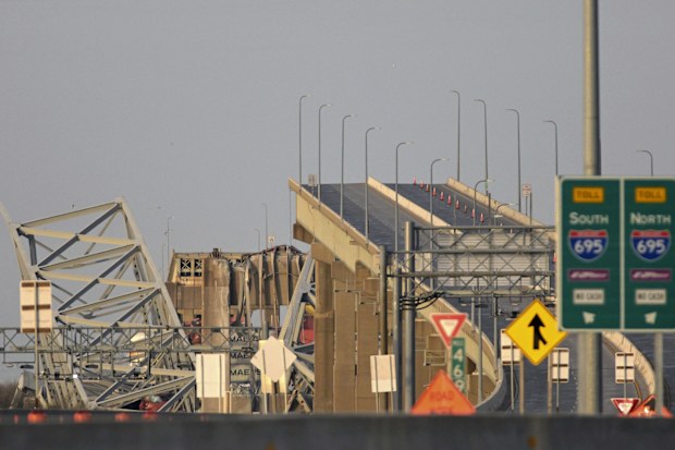 Parts of the Francis Scott Key Bridge remain after a container ship collided with a support Tuesday, March 26, 2024 in Baltimore. 