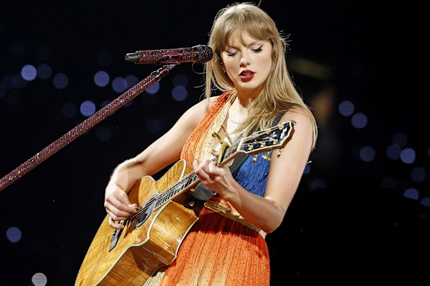 TORONTO, ONTARIO - NOVEMBER 14: EDITORIAL USE ONLY. NO STANDALONE PUBLICATION USE (NO SPECIAL INTEREST OR SINGLE ARTIST PUBLICATION USE; NO BOOK USE). Taylor Swift performs onstage during "Taylor Swift | The Eras Tour" at Rogers Centre on November 14, 2024 in Toronto, Ontario. (Photo by Emma McIntyre/TAS24/Getty Images for TAS Rights Management)