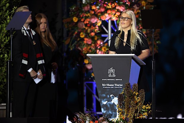 Brooke Warne speaks on stage during the state memorial service for Shane Warne at the Melbourne Cricket Ground on March 30, 2022 in Melbourne, Australia. 
