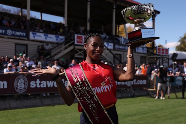 STAWELL, AUSTRALIA - APRIL 06: Sha'Carri Richardson celebrates with a trophy after winning the Powercor Women's Gift during the 2026 Stawell Gift at Central Park on April 06, 2026 in Stawell, Australia. (Photo by Maya Thompson/Getty Images)