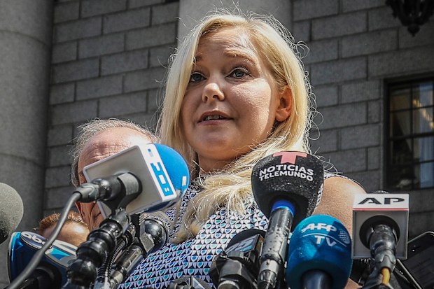Virginia Roberts Giuffre holds a news conference outside a Manhattan court following the jailhouse death of Jeffrey Epstein, Aug. 27, 2019
