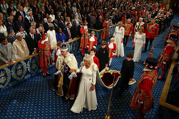 King Charles III, wearing the Imperial State Crown, and Queen Camilla, wearing the Diamond Diadem