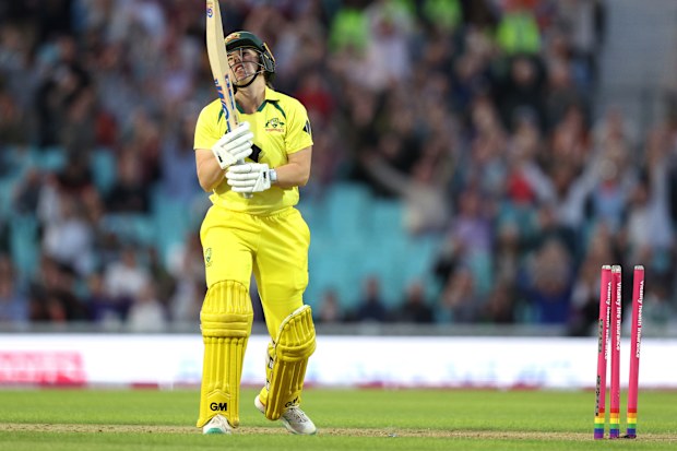 Georgia Wareham of Australia is bowled by Lauren Bell of England.