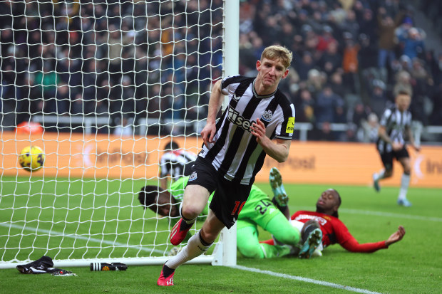 Anthony Gordon of Newcastle United celebrates after scoring.