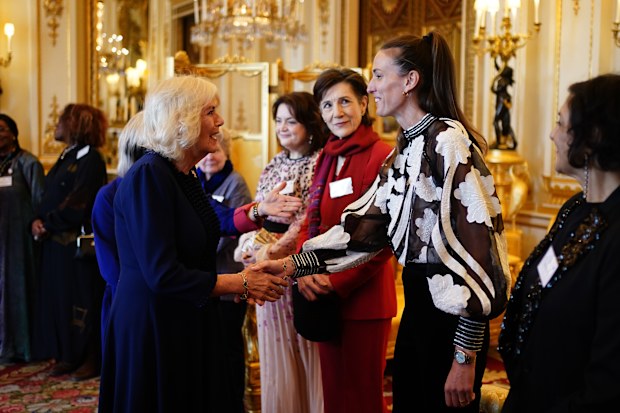 Queen Camilla greets former professional footballer Jill Scott 