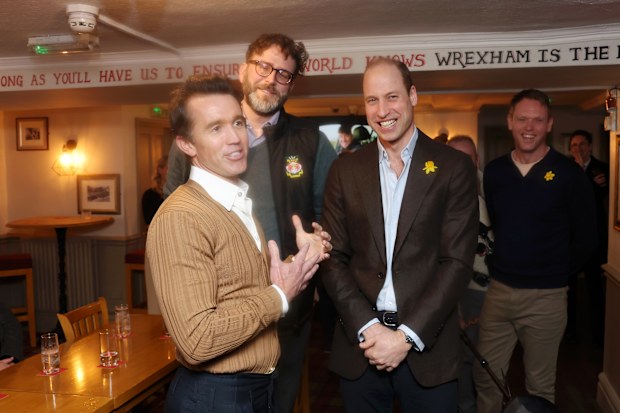 Chairman of Wrexham AFC Rob McElhenney, Executive Director of Wrexham AFC Humphrey Ker and Prince William, Prince of Wales