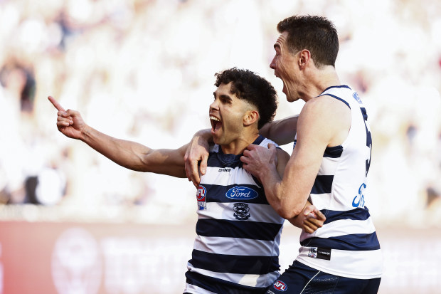 Tyson Stengle of the Cats (L) celebrates with Jeremy Cameron of the Cats afterkicking a goal during the 2022 AFL Grand Final match between the Geelong Cats and the Sydney Swans at the Melbourne Cricket Ground on September 24, 2022 in Melbourne, Australia. (Photo by Daniel Pockett/AFL Photos/via Getty Images)