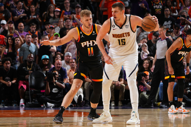 PHOENIX, AZ - MAY 7: Nikola Jokic #15 of the Denver Nuggets dribbles the ball during the game against the Phoenix Suns during the Western Conference Semi Finals of the 2023 NBA Playoffs on May 7, 2022 at Footprint Center in Phoenix, Arizona. NOTE TO USER: User expressly acknowledges and agrees that, by downloading and or using this photograph, user is consenting to the terms and conditions of the Getty Images License Agreement. Mandatory Copyright Notice: Copyright 2022 NBAE (Photo by Garrett El