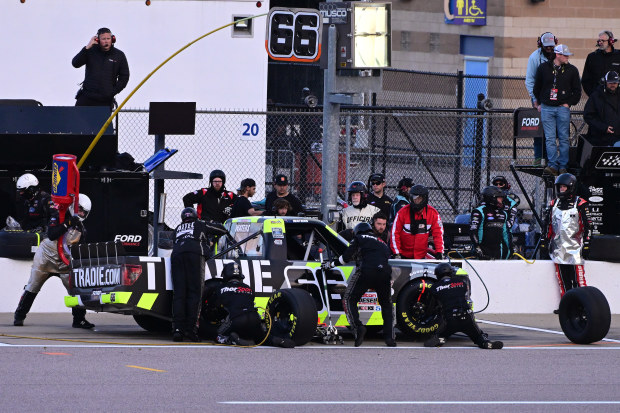 Cam Waters, driver of the No.66 Ford, pits during the NASCAR Truck Series race at Kansas Speedway.