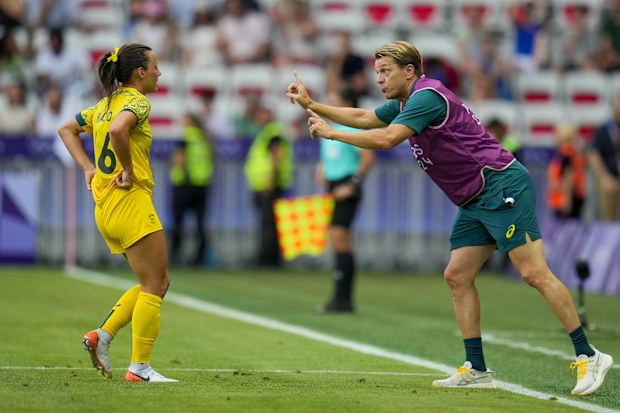 Australia head coach Tony Gustavsson (R) gives instructions to Hayley Raso (L). Australia v Zambia.