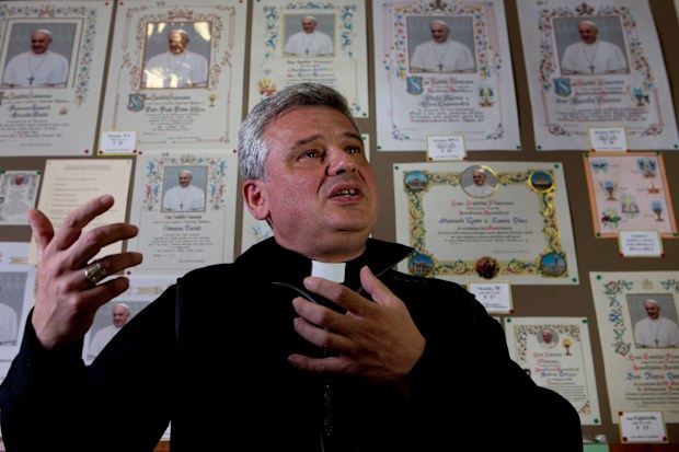 Monsignor Konrad Krajewski has been known to hand out sleeping bags to the homeless in Rome. Picture: AP