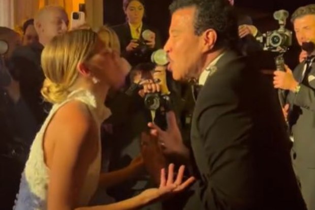 Lionel Richie walking Sofia down the aisle