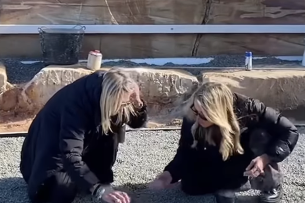 Jackie O buries crystals underneath new house build.
