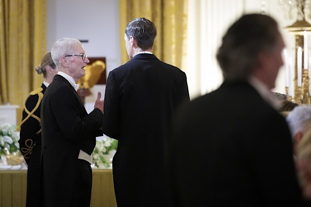 Tim Cook speaks with President Donald Trump's son-in-law Jared Kushner at the state dinner hosted by President Trump and First Lady Melania Trump for King Charles and Queen Camilla on April 28, 2026.