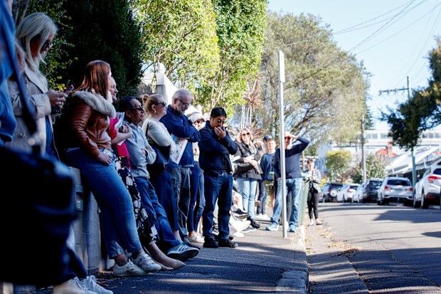 Potential bidders attend an auction