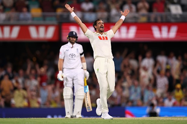 BRISBANE, AUSTRALIA - DECEMBER 06: Mitchell Starc of Australia successfully appeals lbw to dismiss Joe Root of England following a review during day three of the Second 2025/26 Ashes Series Test Match between Australia and England at The Gabba on December 06, 2025 in Brisbane, Australia. (Photo by Cameron Spencer/Getty Images)