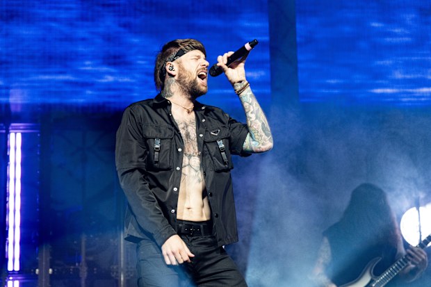 NEW ORLEANS, LOUISIANA - MAY 06: Caleb Shomo of Beartooth performs at Smoothie King Center on May 06, 2025 in New Orleans, Louisiana. (Photo by Erika Goldring/Getty Images)