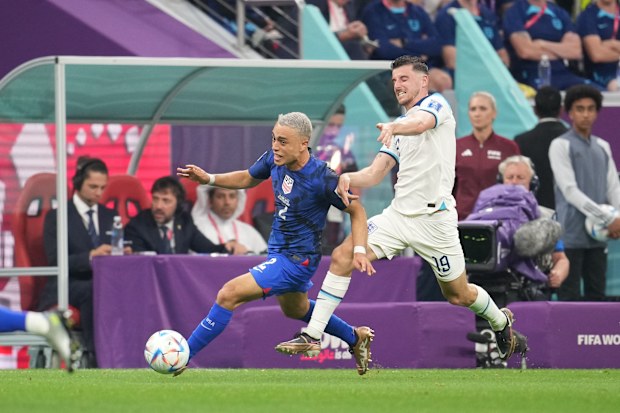 Sergino Dest #2 of the United States is marked by Mason Mount #19 of England during a FIFA World Cup Qatar 2022 Group B match between England and USMNT at Al Bayt Stadium on November 25, 2022 in Al Khor, Qatar. (Photo by Brad Smith/ISI Photos/Getty Images)