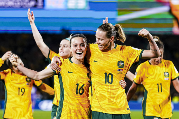 Hayley Raso and Emily Van Egmond celebrate after the Matildas' convincing 2-0 win over Denmark.