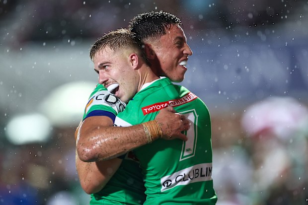 Ethan Sanders of the Raiders celebrates his try with Joseph Tapine.