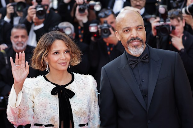 Halle Berry and Van Hunt attend "The Phoenician Scheme" red carpet during The 78th Annual Cannes Film Festival at Palais des Festivals on May 18, 2025 in Cannes, France.