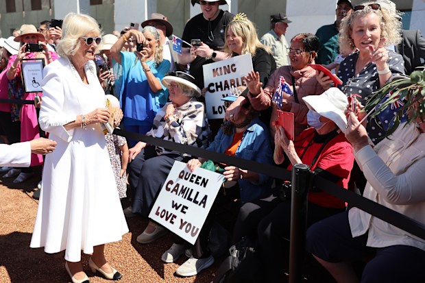 Queen Camilla meets members of the public during a walk about outside Parliament House on October 21, 2024 in Canberra, Australia. The King's visit to Australia is his first as monarch, and the Commonwealth Heads of Government Meeting (CHOGM) in Samoa will be his first as head of the Commonwealth. 