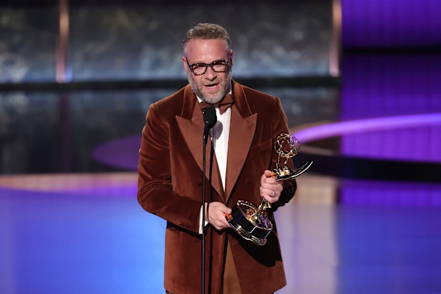 LOS ANGELES, CALIFORNIA - SEPTEMBER 14: Seth Rogen accepts the Outstanding Lead Actor in a Comedy Series award for "The Studio" onstage during the 77th Primetime Emmy Awards at Peacock Theater on September 14, 2025 in Los Angeles, California.  (Photo by Kevin Winter/Getty Images)