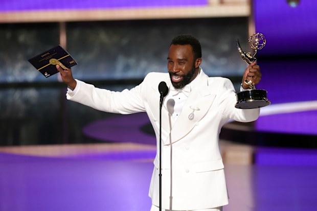 LOS ANGELES, CALIFORNIA - SEPTEMBER 14: Tramell Tillman accepts the Outstanding Supporting Actor in a Drama Series award for "Severance" onstage during the 77th Primetime Emmy Awards at Peacock Theater on September 14, 2025 in Los Angeles, California.  (Photo by Kevin Winter/Getty Images)