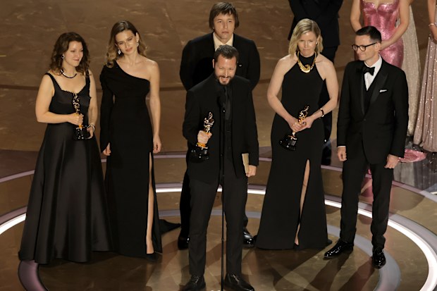 Raney Aronson-Rath, Mstyslav Chernov and Michelle Mizner accept the Best Documentary Feature Film for "20 Days in Mariupol" onstage during the 96th Annual Academy Awards at Dolby Theatre on March 10, 2024 in Hollywood, California. 