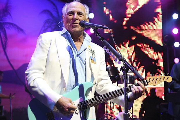 Jimmy Buffett performs at the after party for the premiere of "Jurassic World" in Los Angeles, on June 9, 2015. 