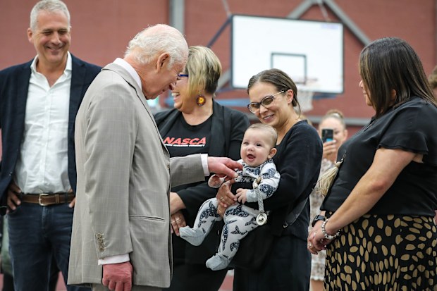 King Charles III greets 5-month-old Jack Rose during a visit to the National Centre of Indigenous Excellence on October 22, 2024 in Sydney, Australia. The King's visit to Australia will be his first as Monarch, and CHOGM in Samoa will be his first as Head of the Commonwealth.  