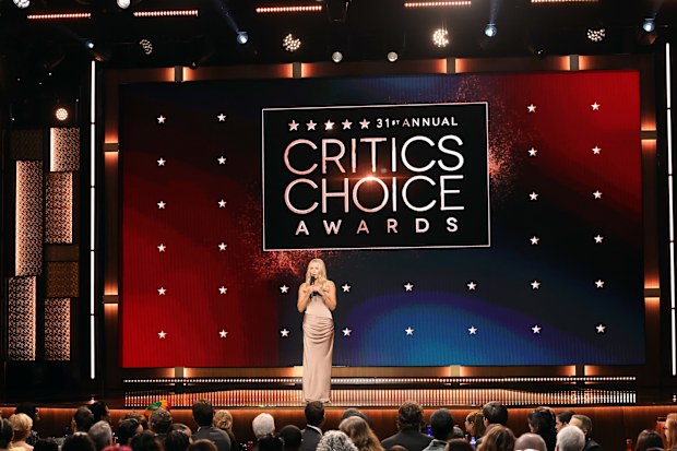 SANTA MONICA, CALIFORNIA - JANUARY 04: Chelsea Handler speaks onstage during the 31st Annual Critics Choice Awards at Barker Hangar on January 04, 2026 in Santa Monica, California.  (Photo by Kevin Winter/Getty Images for Critics Choice Association)