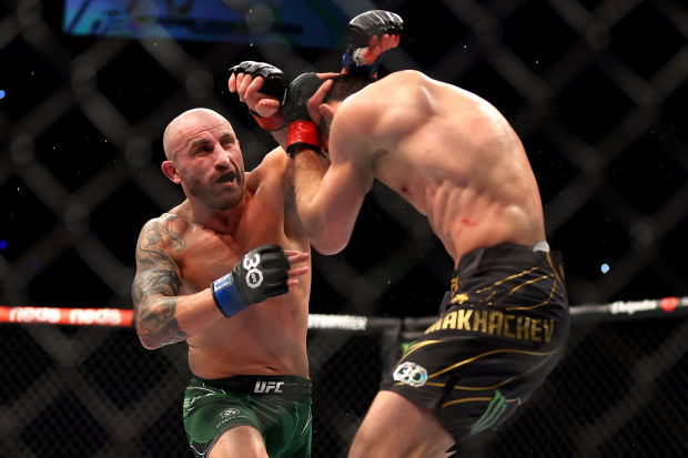 Alex Volkanovski lands a punch that levelled Islam Makhachev in their UFC lightweight championship fight during UFC 284 at RAC Arena.