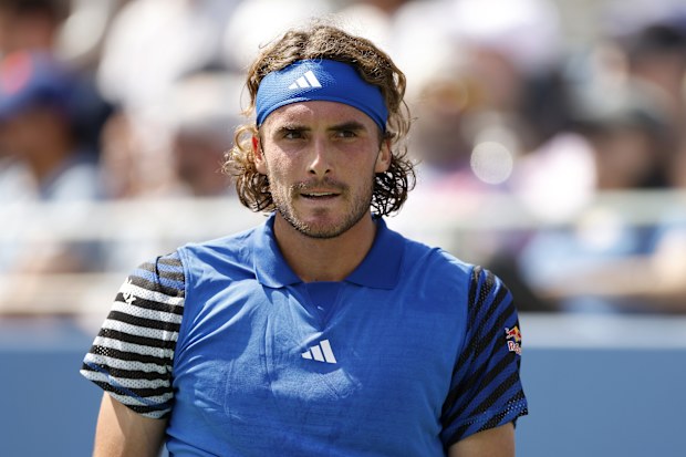 Stefanos Tsitsipas of Greece reacts after a point against Dominic Stephan Stricker of Switzerland.
