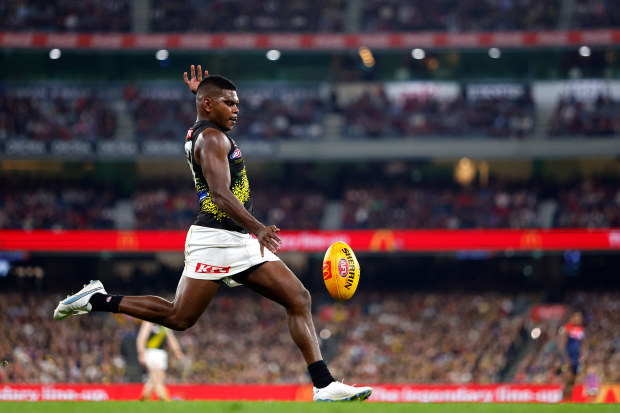 MELBOURNE, AUSTRALIA - APRIL 24: Maurice Rioli of the Tigers kicks the ball during the 2023 AFL Round 06 match between the Melbourne Demons and the Richmond Tigers at the Melbourne Cricket Ground on April 24, 2023 in Melbourne, Australia. (Photo by Dylan Burns/AFL Photos)