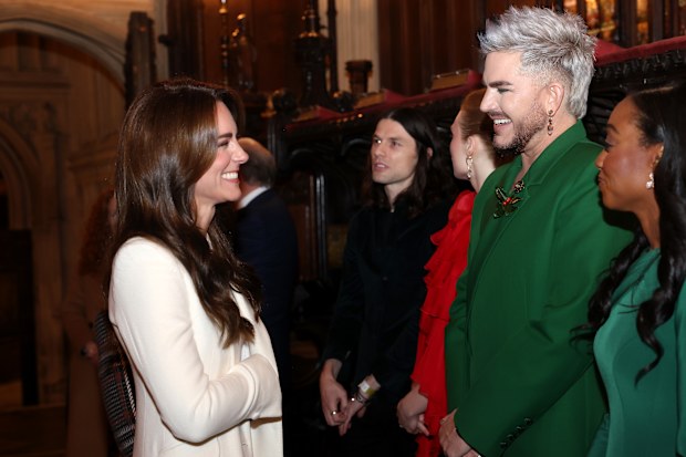 LONDON, ENGLAND - DECEMBER 08: Catherine, Princess of Wales speaks with Adam Lambert at The "Together At Christmas" Carol Service at Westminster Abbey on December 08, 2023 in London, England. Spearheaded by The Princess of Wales, and supported by The Royal Foundation, the service is a moment to bring people together at Christmas time and recognise those who have gone above and beyond to help others throughout the year. (Photo by Chris Jackson/Getty Images)
