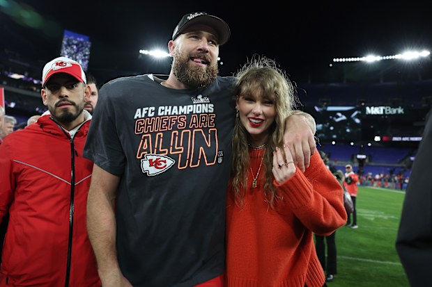 Taylor Swift and Travis Kelce after the Chiefs win at the AFC Championship Game.