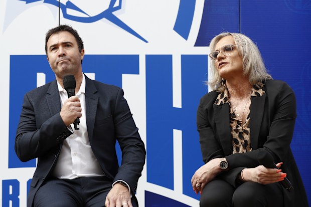 Former North Melbourne senior coaches Brad Scott and Dani Laidley speak during a North Melbourne Kangaroos event in 2021.