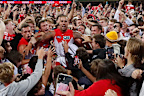 Lance Franklin celebrates with fans after kicking his 1000th goal during the 2022 AFL Round 2 match against Geelong Cats at the Sydney Cricket Ground.